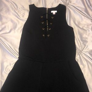 Black lace/tie romper with pockets size small